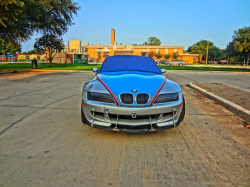 1998 BMW M Roadster in Arctic Silver Metallic over Imola Red & Black Nappa