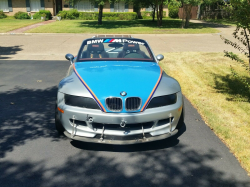 1998 BMW M Roadster in Arctic Silver Metallic over Imola Red & Black Nappa