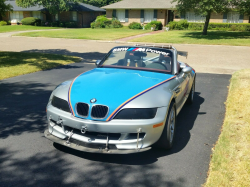 1998 BMW M Roadster in Arctic Silver Metallic over Imola Red & Black Nappa