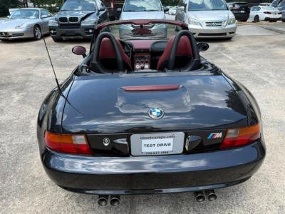 1998 BMW M Roadster in Cosmos Black Metallic over Imola Red & Black Nappa