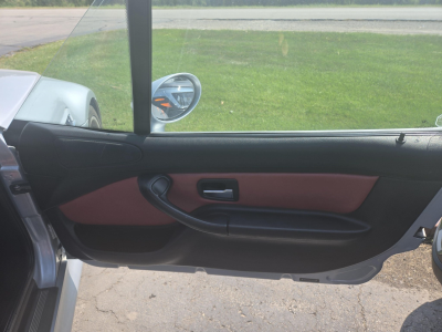 1998 BMW M Roadster in Arctic Silver Metallic over Imola Red & Black Nappa