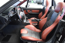 1998 BMW M Roadster in Cosmos Black Metallic over Imola Red & Black Nappa
