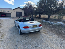 1998 BMW M Roadster in Arctic Silver Metallic over Imola Red & Black Nappa