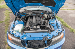 1998 BMW M Roadster in Estoril Blue Metallic over Estoril Blue & Black Nappa