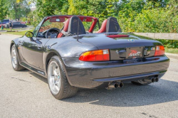 1998 BMW M Roadster in Cosmos Black Metallic over Imola Red & Black Nappa