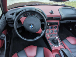 1999 BMW M Roadster in Cosmos Black Metallic over Imola Red & Black Nappa