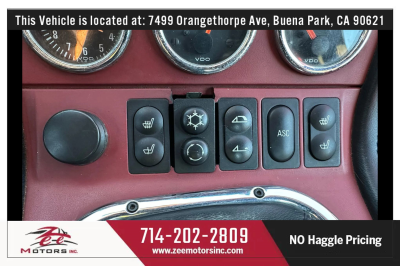 1999 BMW M Roadster in Imola Red 2 over Imola Red & Black Nappa