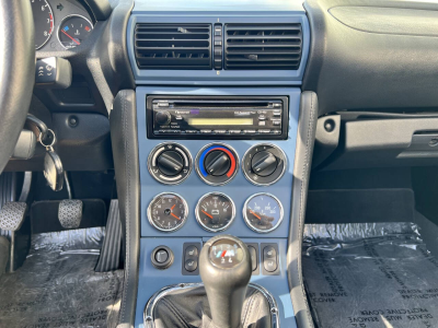 1999 BMW M Roadster in Estoril Blue Metallic over Estoril Blue & Black Nappa