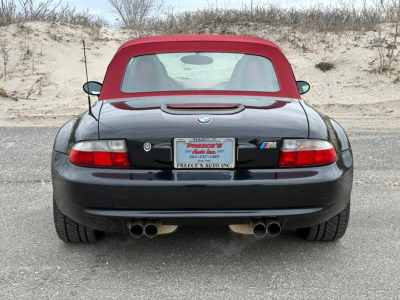 1999 BMW M Roadster in Cosmos Black Metallic over Imola Red & Black Nappa