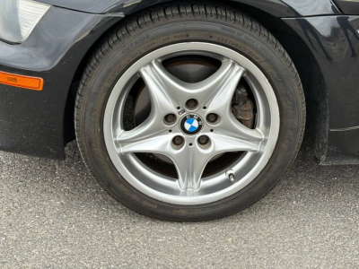 1999 BMW M Roadster in Cosmos Black Metallic over Imola Red & Black Nappa