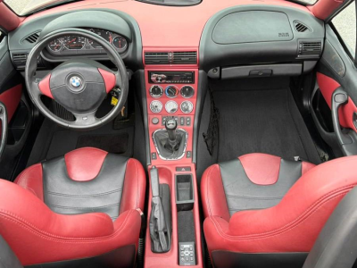 1999 BMW M Roadster in Cosmos Black Metallic over Imola Red & Black Nappa