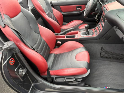 1999 BMW M Roadster in Cosmos Black Metallic over Imola Red & Black Nappa