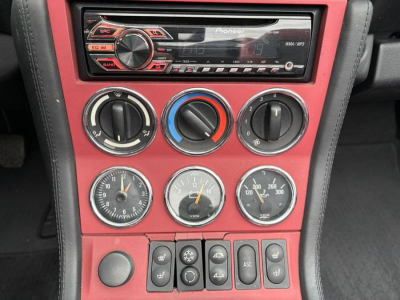 1999 BMW M Roadster in Cosmos Black Metallic over Imola Red & Black Nappa