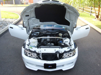 1999 BMW M Roadster in Alpine White 3 over Imola Red & Black Nappa