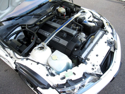 1999 BMW M Roadster in Alpine White 3 over Imola Red & Black Nappa