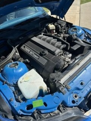 1999 BMW M Roadster in Estoril Blue Metallic over Estoril Blue & Black Nappa