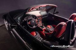 1999 BMW M Roadster in Cosmos Black Metallic over Imola Red & Black Nappa