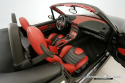 1999 BMW M Roadster in Cosmos Black Metallic over Imola Red & Black Nappa