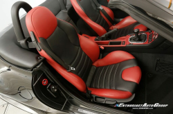 1999 BMW M Roadster in Cosmos Black Metallic over Imola Red & Black Nappa