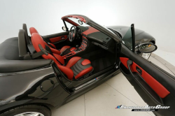 1999 BMW M Roadster in Cosmos Black Metallic over Imola Red & Black Nappa