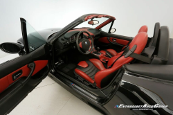1999 BMW M Roadster in Cosmos Black Metallic over Imola Red & Black Nappa