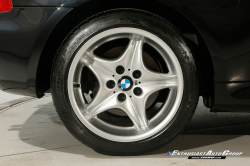1999 BMW M Roadster in Cosmos Black Metallic over Imola Red & Black Nappa