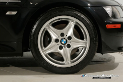 1999 BMW M Roadster in Cosmos Black Metallic over Imola Red & Black Nappa