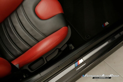 1999 BMW M Roadster in Cosmos Black Metallic over Imola Red & Black Nappa