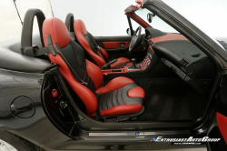 1999 BMW M Roadster in Cosmos Black Metallic over Imola Red & Black Nappa