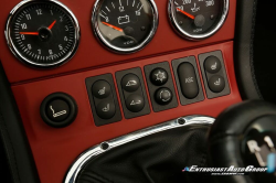 1999 BMW M Roadster in Cosmos Black Metallic over Imola Red & Black Nappa