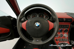1999 BMW M Roadster in Cosmos Black Metallic over Imola Red & Black Nappa