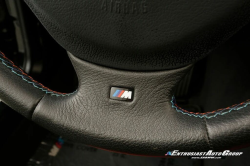 1999 BMW M Roadster in Cosmos Black Metallic over Imola Red & Black Nappa