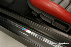 1999 BMW M Roadster in Cosmos Black Metallic over Imola Red & Black Nappa