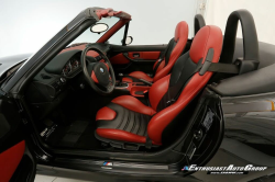 1999 BMW M Roadster in Cosmos Black Metallic over Imola Red & Black Nappa