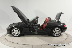 1999 BMW M Roadster in Cosmos Black Metallic over Imola Red & Black Nappa