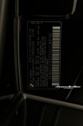 1999 BMW M Roadster in Cosmos Black Metallic over Imola Red & Black Nappa