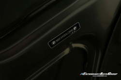 1999 BMW M Roadster in Cosmos Black Metallic over Imola Red & Black Nappa