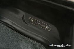 1999 BMW M Roadster in Cosmos Black Metallic over Imola Red & Black Nappa