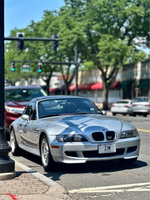 1999 BMW M Roadster in Arctic Silver Metallic over Imola Red & Black Nappa