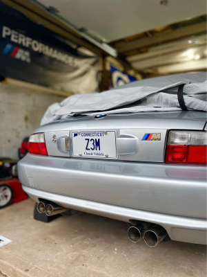 1999 BMW M Roadster in Arctic Silver Metallic over Imola Red & Black Nappa