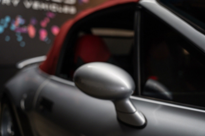 1999 BMW M Roadster in Arctic Silver Metallic over Imola Red & Black Nappa