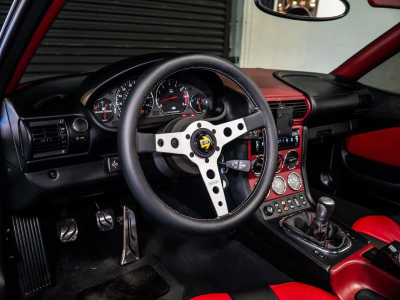 1999 BMW M Roadster in Arctic Silver Metallic over Imola Red & Black Nappa