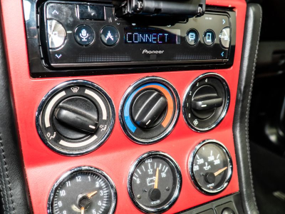 1999 BMW M Roadster in Arctic Silver Metallic over Imola Red & Black Nappa