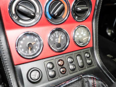 1999 BMW M Roadster in Arctic Silver Metallic over Imola Red & Black Nappa