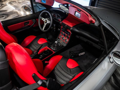 1999 BMW M Roadster in Arctic Silver Metallic over Imola Red & Black Nappa