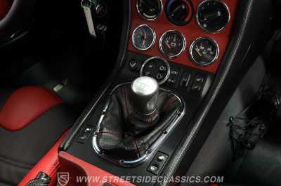 1999 BMW M Roadster in Arctic Silver Metallic over Imola Red & Black Nappa