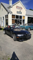 1999 BMW M Roadster in Cosmos Black Metallic over Imola Red & Black Nappa