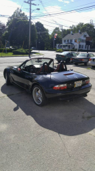 1999 BMW M Roadster in Cosmos Black Metallic over Imola Red & Black Nappa