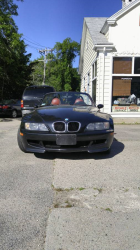 1999 BMW M Roadster in Cosmos Black Metallic over Imola Red & Black Nappa