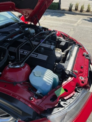 2000 BMW M Roadster in Imola Red 2 over Black Nappa